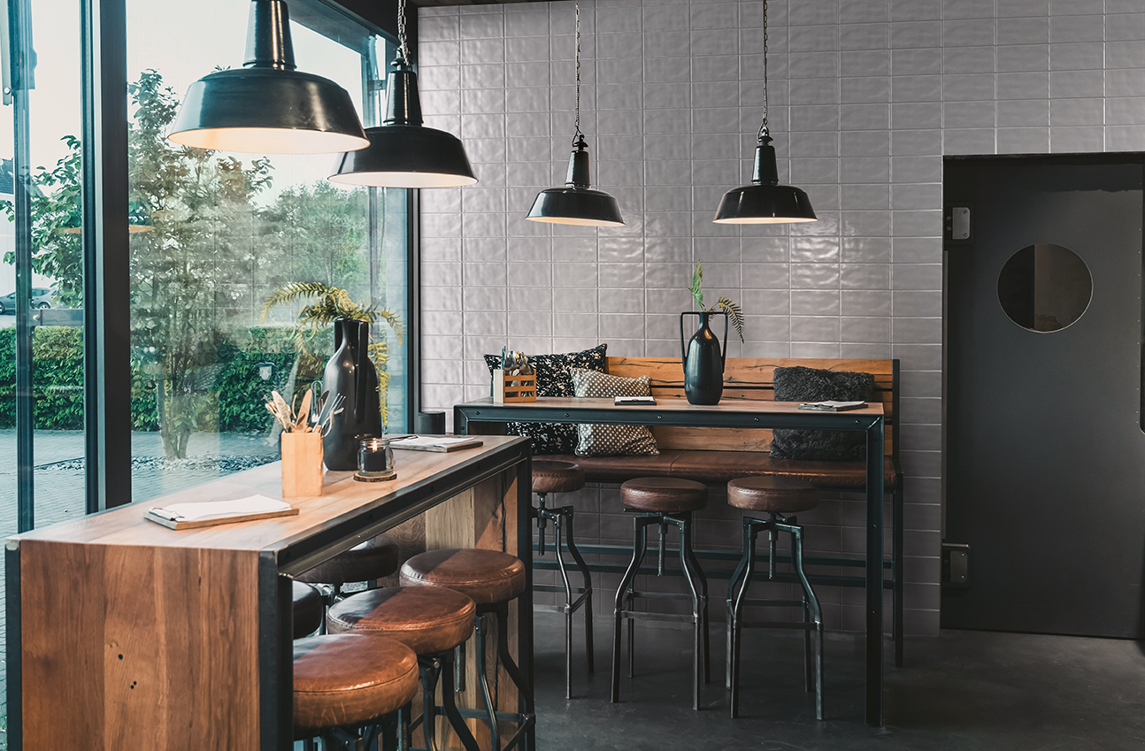 Seating,Area,With,Bar,Tables,And,Bar,Chairs,In,A