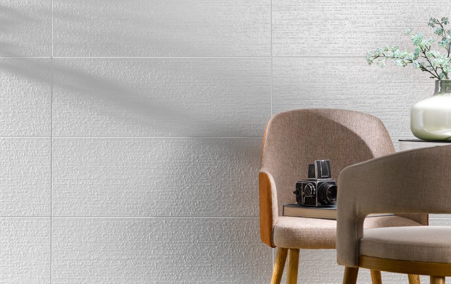 Azulejo branco 3D More Code Mate num espaço interior elegante