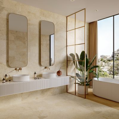 Cerâmica com efeito de pedra natural Rapolano da Recer, numa casa de banho sofisticada.